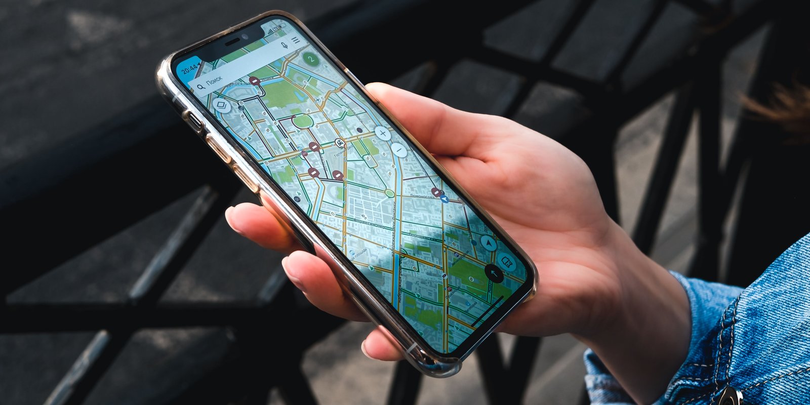 Person checking a local map on a phone