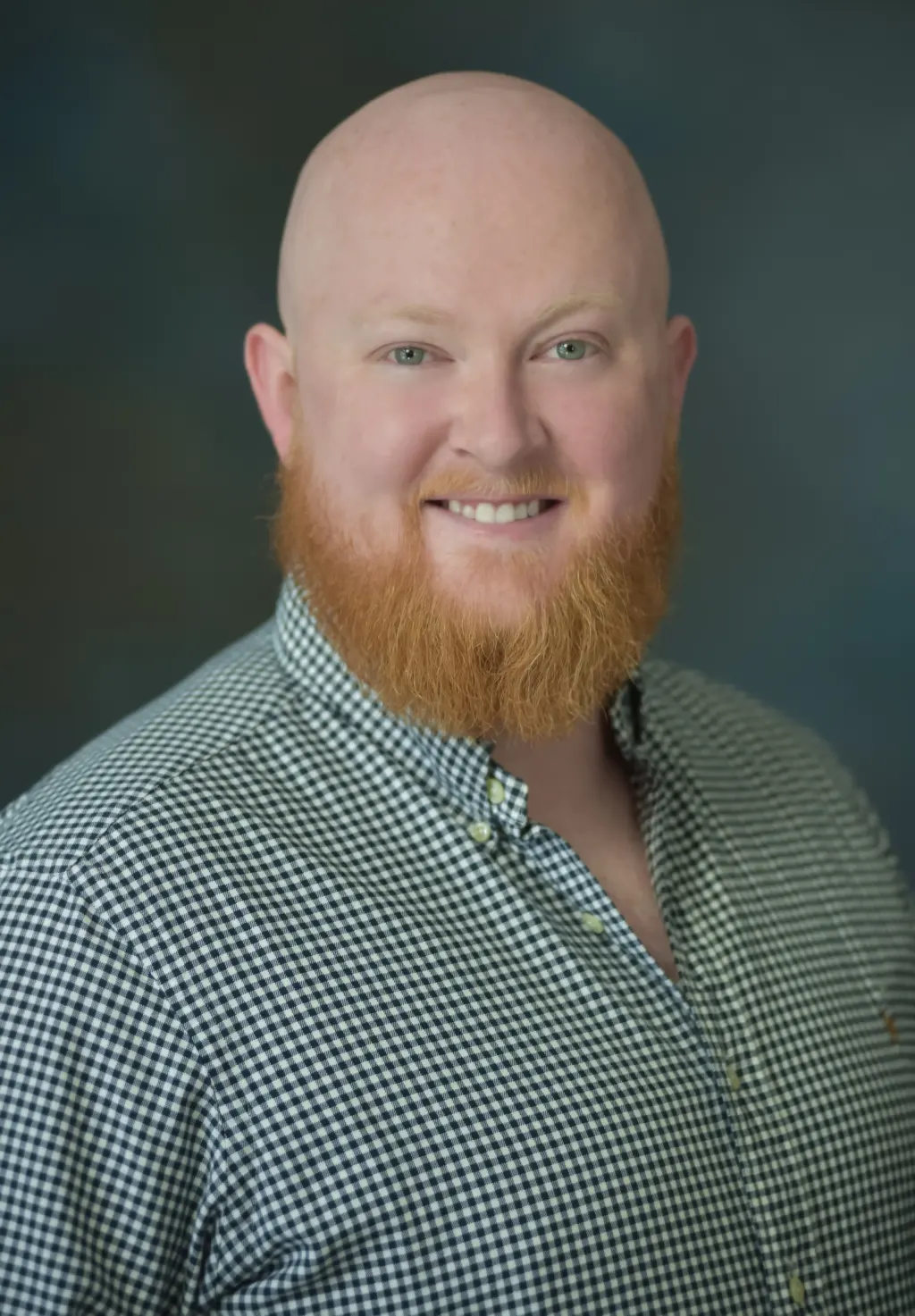 Headshot of Taylor Kelly, Raleigh web designer and local SEO specialist